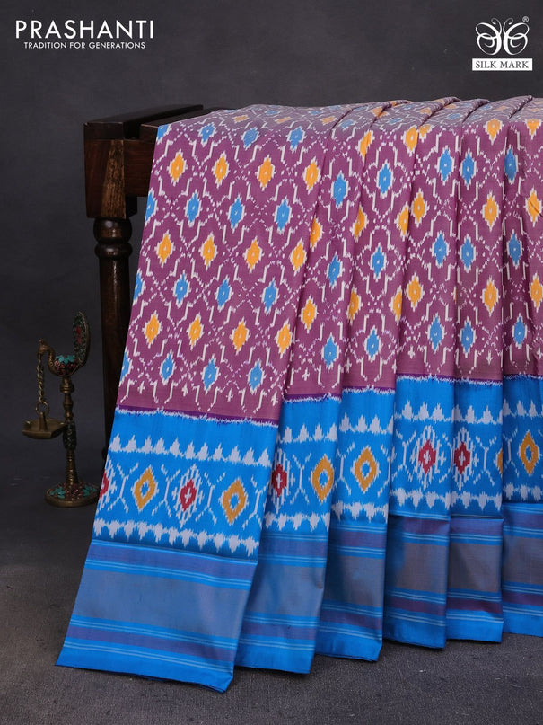 Pochampally silk saree purple and cs blue with allover ikat weaves and ikat woven zari border