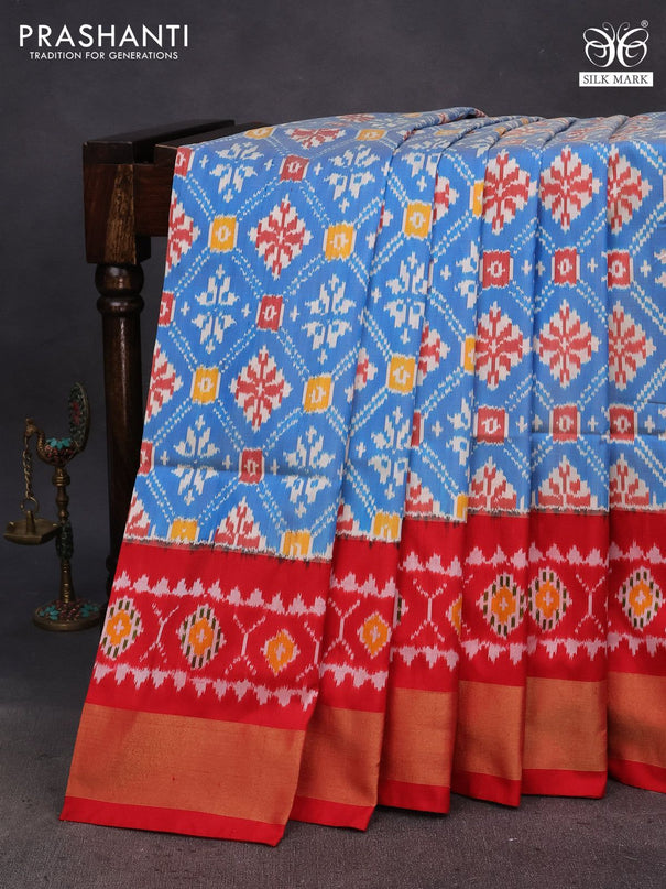 Pochampally silk saree cs blue and red with allover ikat weaves and ikat style zari woven border