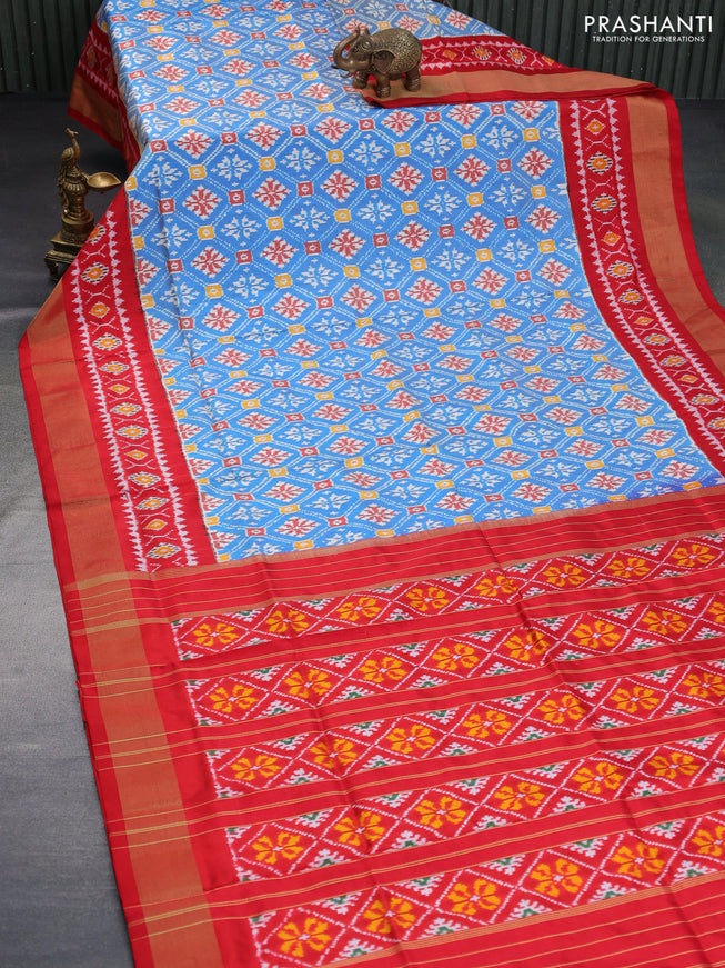 Pochampally silk saree cs blue and red with allover ikat weaves and ikat style zari woven border