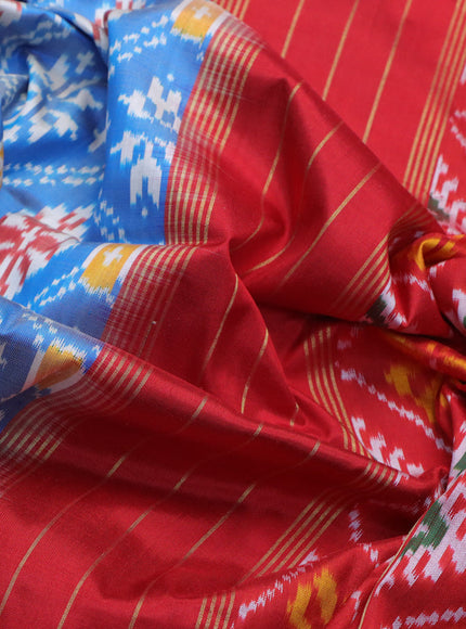 Pochampally silk saree cs blue and red with allover ikat weaves and ikat style zari woven border