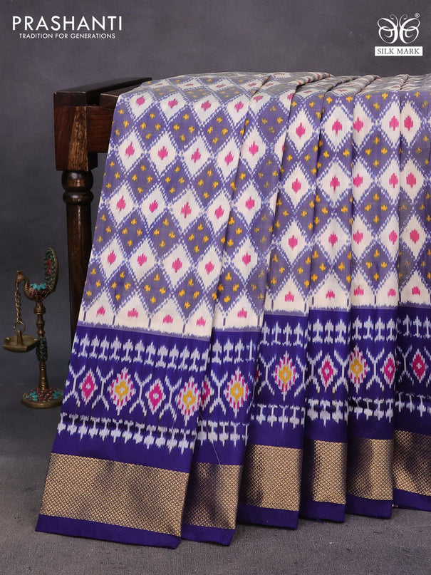 Pochampally silk saree cream and blue with allover ikat weaves and zari woven border