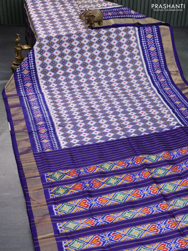 Pochampally silk saree cream and blue with allover ikat weaves and zari woven border