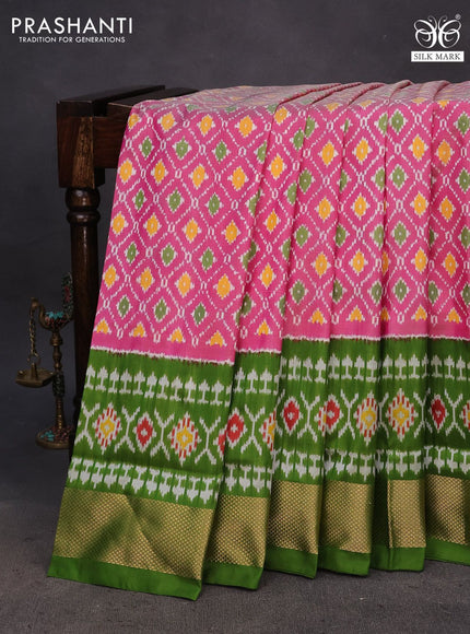 Pochampally silk saree pink and green with allover ikat weaves and ikat woven zari border