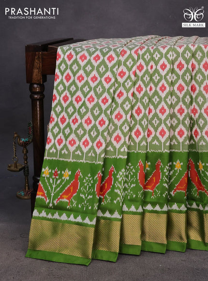 Pochampally silk saree cream green and green with allover ikat weaves and ikat woven zari border