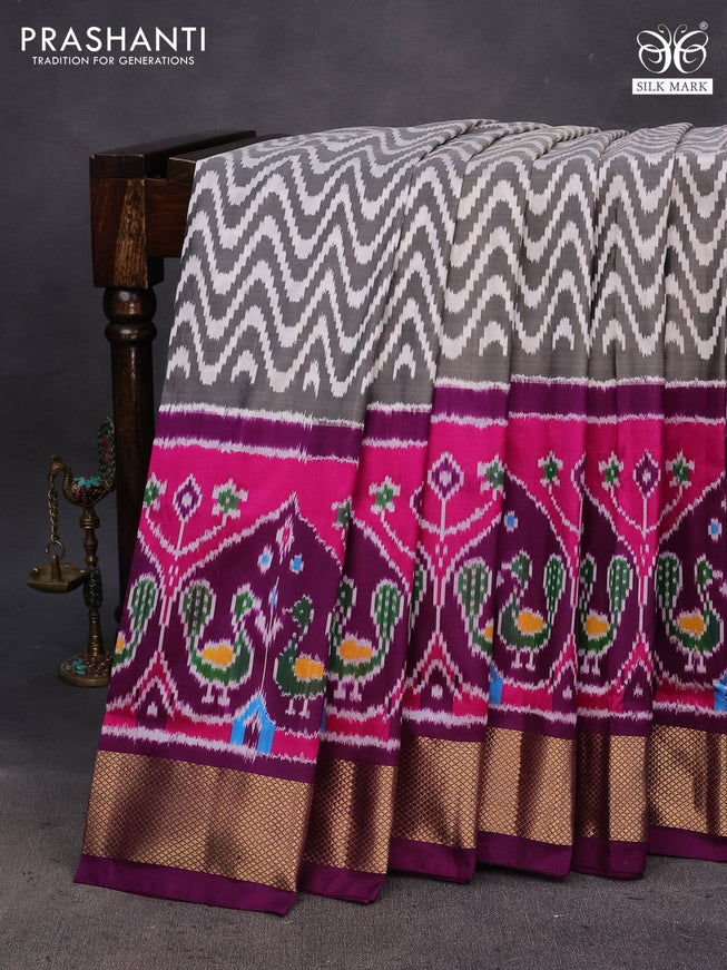 Pochampally silk saree off white black and purple with allover ikat weaves and ikat woven zari border