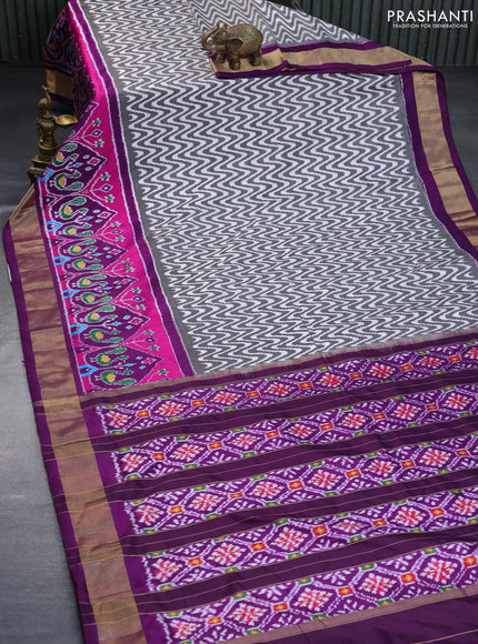 Pochampally silk saree off white black and purple with allover ikat weaves and ikat woven zari border