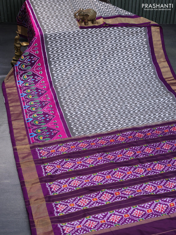 Pochampally silk saree off white black and purple with allover ikat weaves and ikat woven zari border