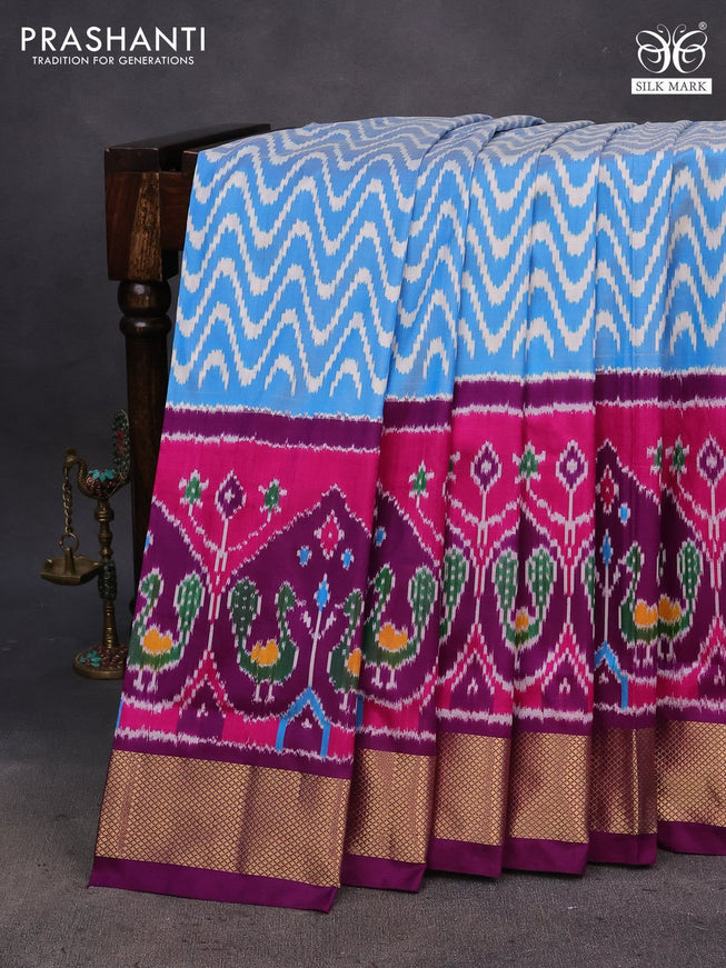 Pochampally silk saree off white blue and purple with allover ikat weaves and long ikat woven zari border