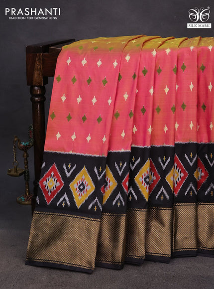 Pochampally silk saree dual shade of pinkish yellow and black with allover ikat butta weaves and ikat woven zari border