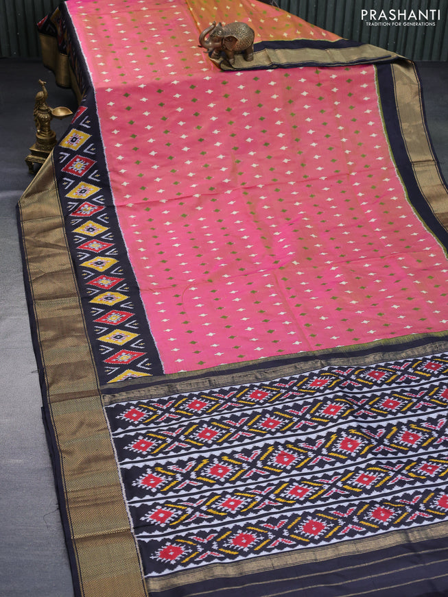 Pochampally silk saree dual shade of pinkish yellow and black with allover ikat butta weaves and ikat woven zari border