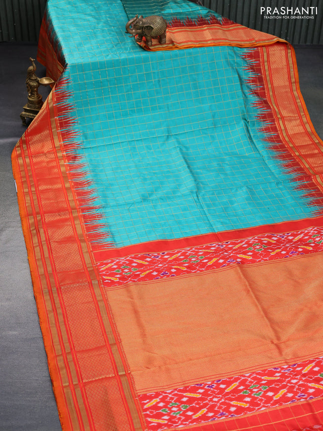 Pochampally silk saree teal green shade and orange with allover zari checked border and temple deisgn zari woven border