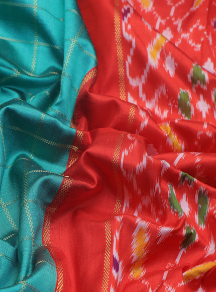 Pochampally silk saree teal green shade and orange with allover zari checked border and temple deisgn zari woven border