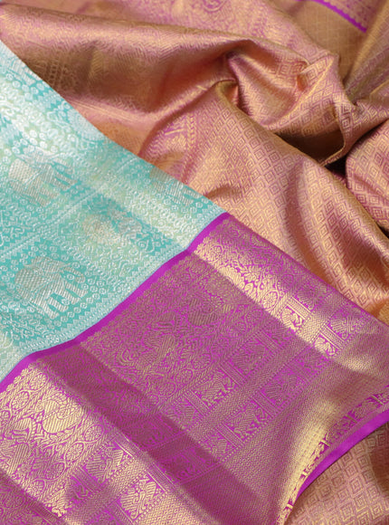 Pure kanchipuram tissue silk saree dual shade of teal blue and purple with allover silver zari woven brocade weaves and long rich zari woven border