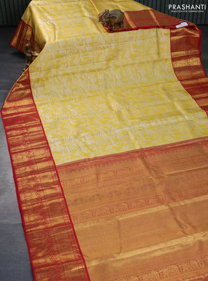 Pure kanchipuram tissue silk saree gold and red with allover silver zari woven brocade weaves and long rich zari woven border