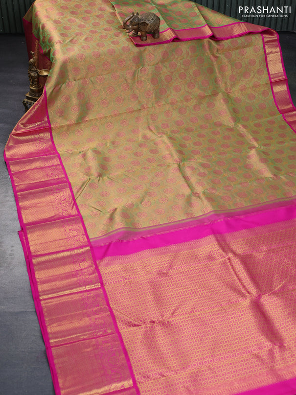 Pure kanchipuram tissue silk saree dual shade of green and pink with allover zari woven floral brocade weaves and long rich zari woven border