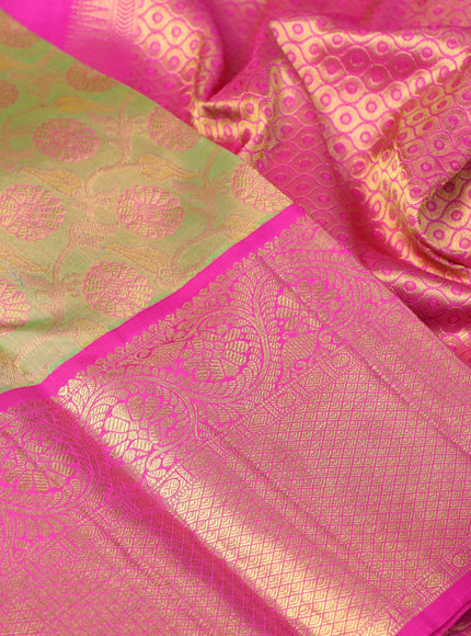 Pure kanchipuram tissue silk saree dual shade of green and pink with allover zari woven floral brocade weaves and long rich zari woven border