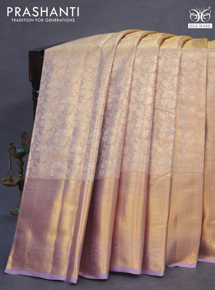 Pure kanchipuram tissue silk saree dual shade of gold and pastel lavender with allover silver zari woven brocade weaves and long zari woven border