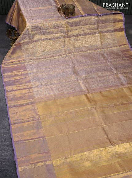 Pure kanchipuram tissue silk saree dual shade of gold and pastel lavender with allover silver zari woven brocade weaves and long zari woven border