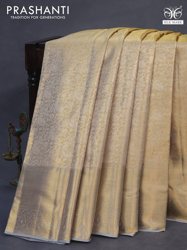 Pure kanchipuram tissue silk saree gold and grey shade with allover zari woven brocade weaves and zari woven border