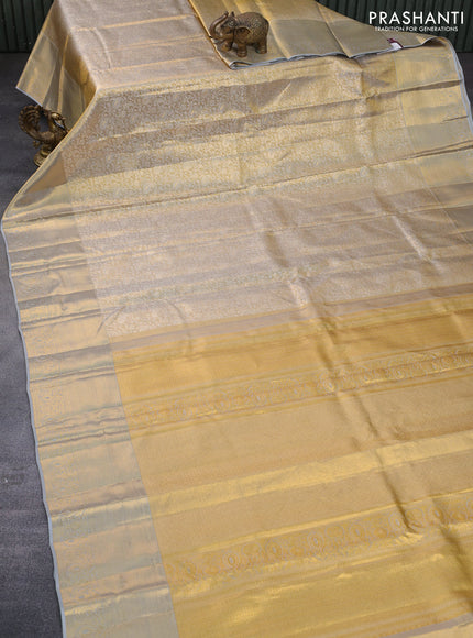 Pure kanchipuram tissue silk saree gold and grey shade with allover zari woven brocade weaves and zari woven border