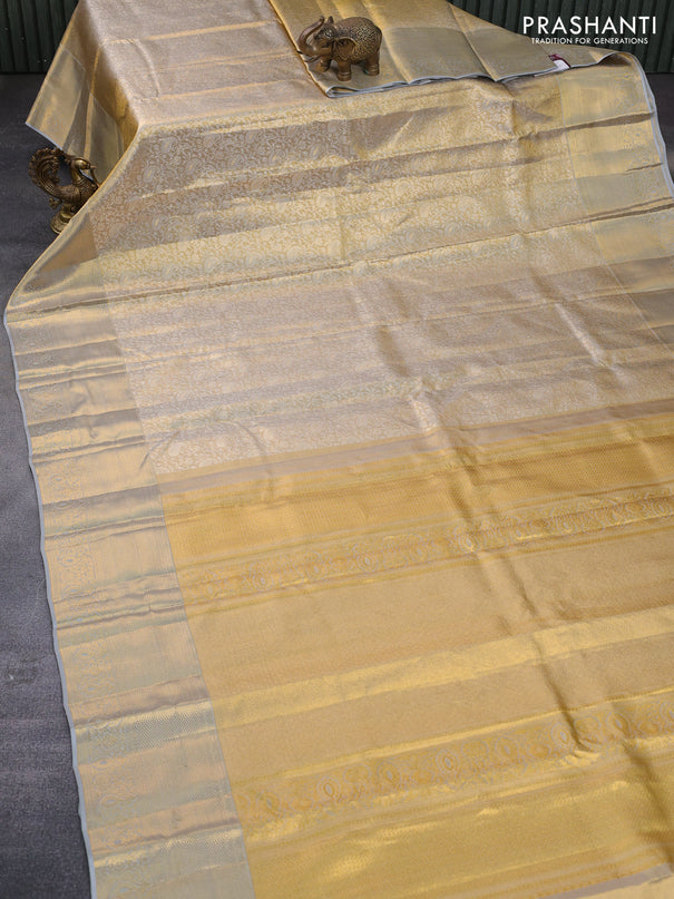 Pure kanchipuram tissue silk saree gold and grey shade with allover zari woven brocade weaves and zari woven border