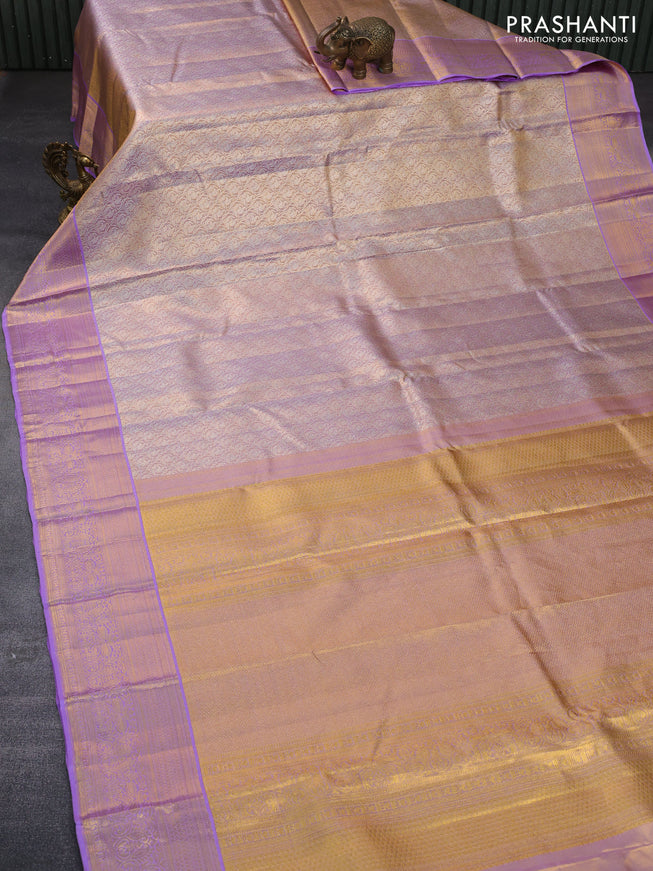 Pure kanchipuram tissue silk saree dual shade of lavender with allover silver zari woven brocade weaves and zari woven border