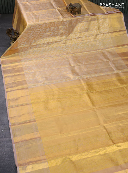 Pure kanchipuram tissue silk saree gold with allover silver zari woven brocade weaves and zari woven border