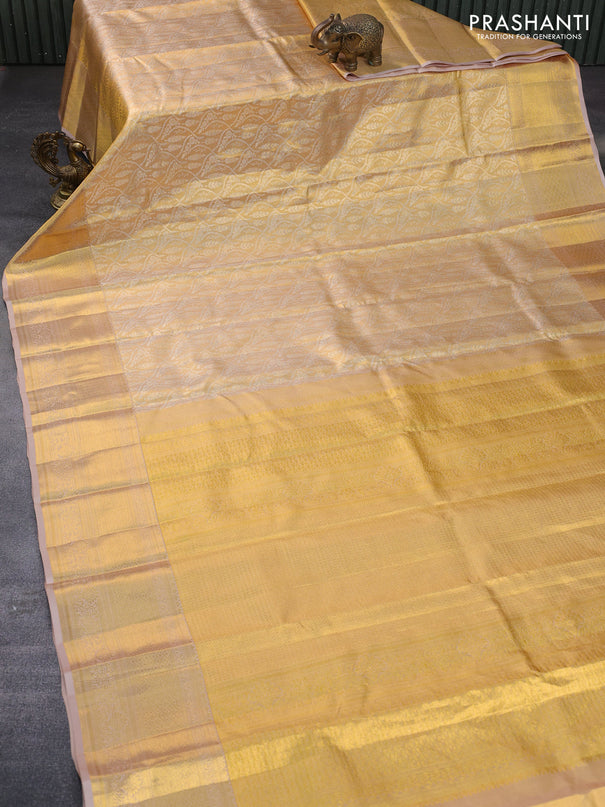 Pure kanchipuram tissue silk saree gold with allover silver zari woven brocade weaves and zari woven border