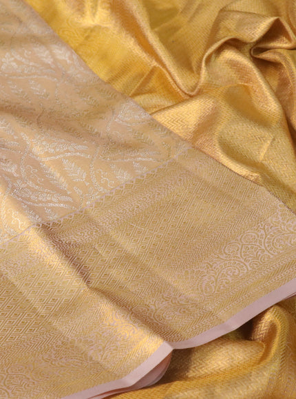 Pure kanchipuram tissue silk saree gold with allover silver zari woven brocade weaves and zari woven border