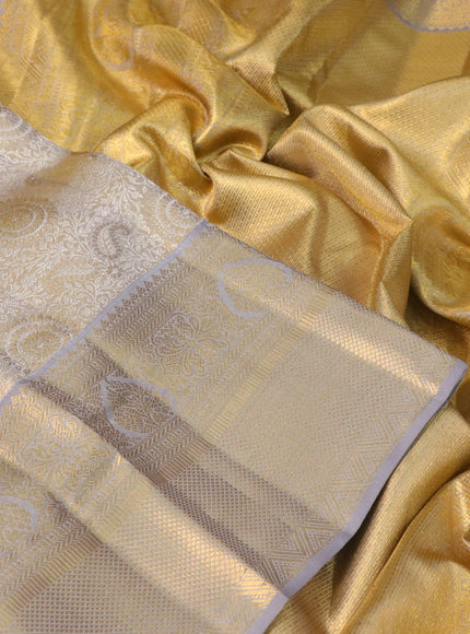 Pure kanchipuram tissue silk saree gold and grey shade with allover silver zari woven brocade weaves and long zari woven border