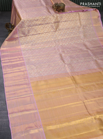 Pure kanchipuram tissue silk saree dual shade of pastel pink with allover silver zari woven brocade weaves and long zari woven border