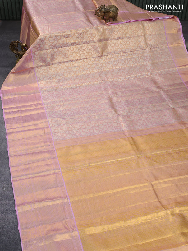 Pure kanchipuram tissue silk saree dual shade of pastel pink with allover silver zari woven brocade weaves and long zari woven border