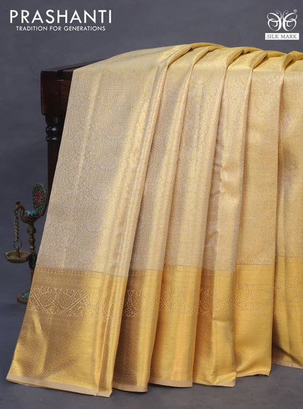 Pure kanchipuram tissue silk saree gold with allover silver zari woven brocade weaves and zari woven border