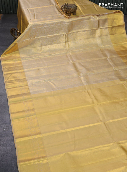 Pure kanchipuram tissue silk saree gold with allover silver zari woven brocade weaves and zari woven border