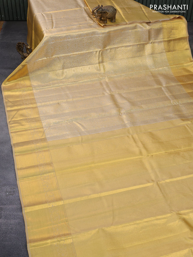 Pure kanchipuram tissue silk saree gold with allover silver zari woven brocade weaves and zari woven border