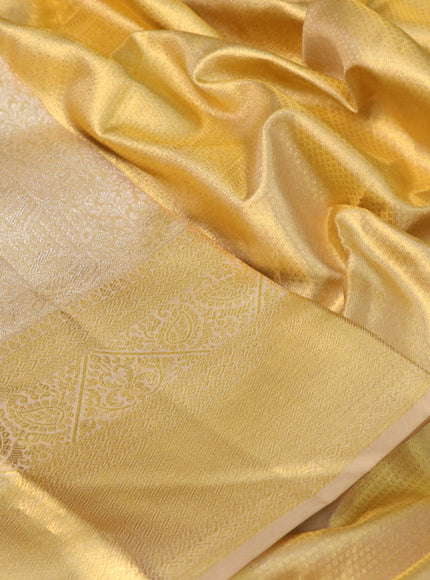 Pure kanchipuram tissue silk saree gold with allover silver zari woven brocade weaves and zari woven border