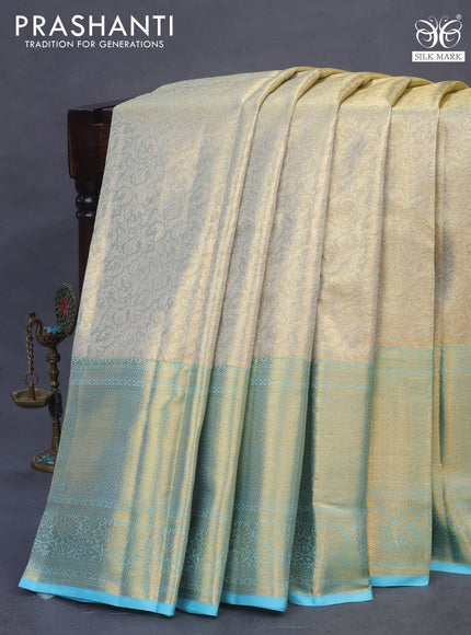 Pure kanchipuram tissue silk saree dual shade of pastel grey and light blue with allover zari woven brocade weaves and long zari woven border