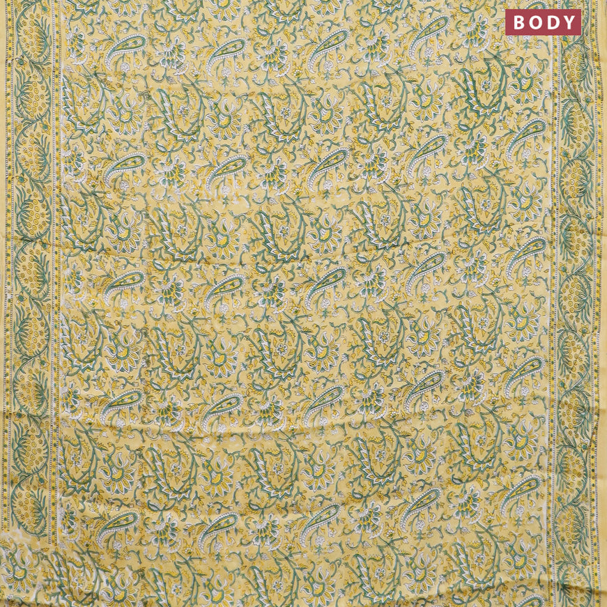 Modal silk saree yellow with allover kalamkari prints and printed border