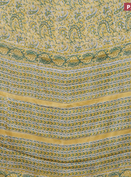 Modal silk saree yellow with allover kalamkari prints and printed border