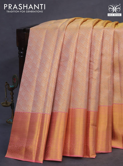 Pure kanchipuram tissue silk saree dual shade of gold and peach pink with allover zari woven brocade weaves and zari woven border