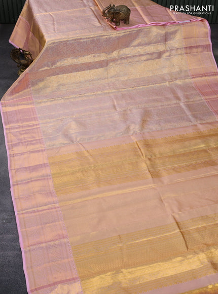 Pure kanchipuram tissue silk saree dual shade of pastel pink with allover silver zari woven brocade weaves and zari woven border