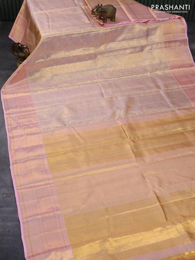 Pure kanchipuram tissue silk saree dual shade of pastel pink with allover silver zari woven brocade weaves and zari woven border