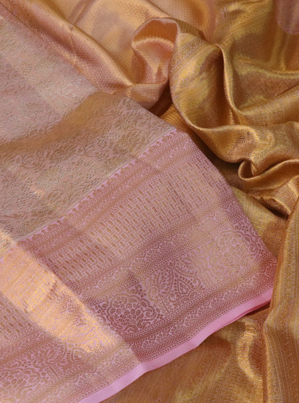 Pure kanchipuram tissue silk saree dual shade of pastel pink with allover silver zari woven brocade weaves and zari woven border