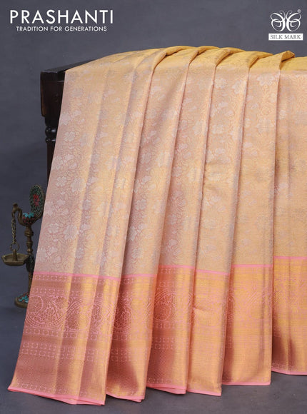 Pure kanchipuram tissue silk saree dual shade of gold and peach pink with allover zari woven brocade weaves and zari woven border