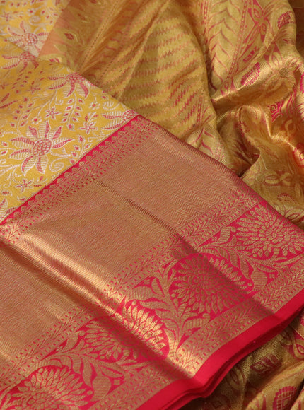 Pure kanchipuram tissue silk saree yellow and red with allover zari woven brocade weaves and long zari woven border