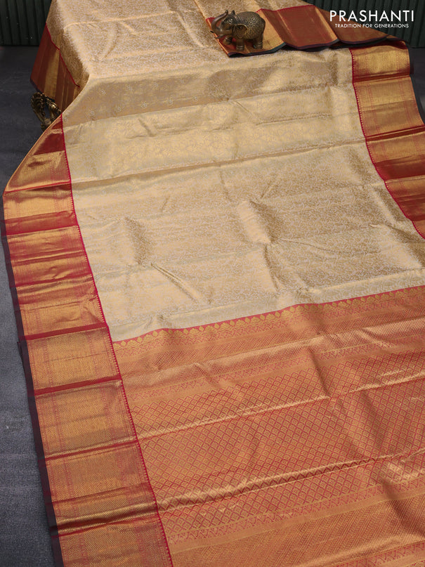 Pure kanchipuram tissue silk saree sandal and pink with allover zari woven brocade weaves and zari woven border