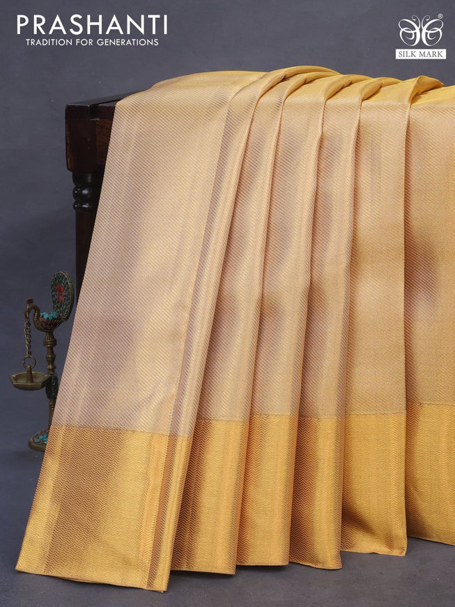 Pure kanchipuram tissue silk saree gold with allover zari woven brocade weaves and zari woven border