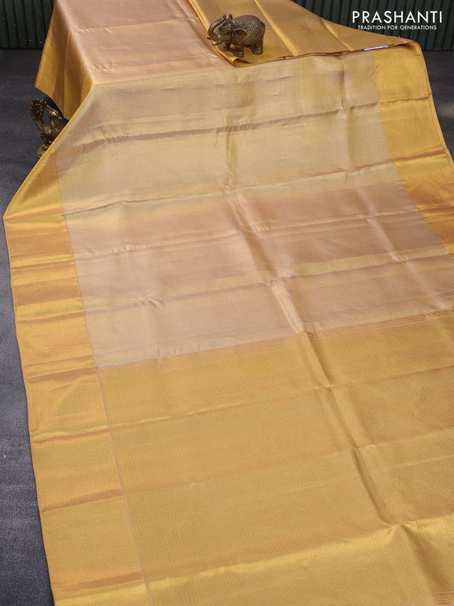 Pure kanchipuram tissue silk saree gold with allover zari woven brocade weaves and zari woven border