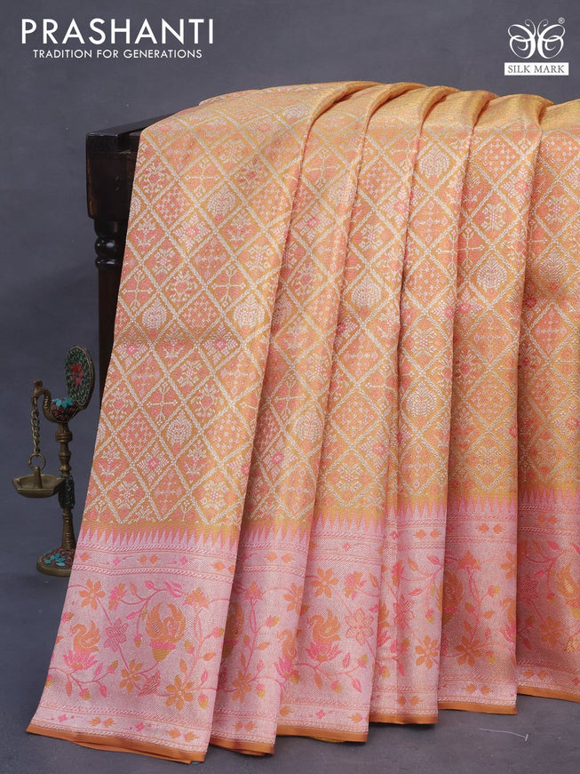 Pure kanchipuram tissue silk saree gold and mild peach pink with allover zari woven brocade weaves and rich temple design zari woven border