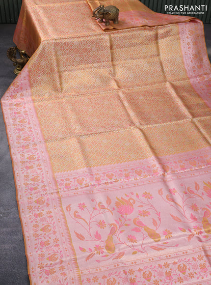 Pure kanchipuram tissue silk saree gold and mild peach pink with allover zari woven brocade weaves and rich temple design zari woven border